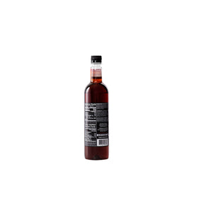 Davinci Gourmet Amaretto Syrup pour demonstrates easy dosing for coffee and cocktails.