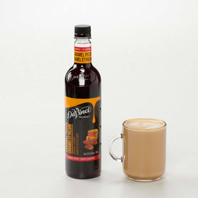 DaVinci Gourmet Classic Caramel Pecan syrup being measured in a shaker demonstrates blendability