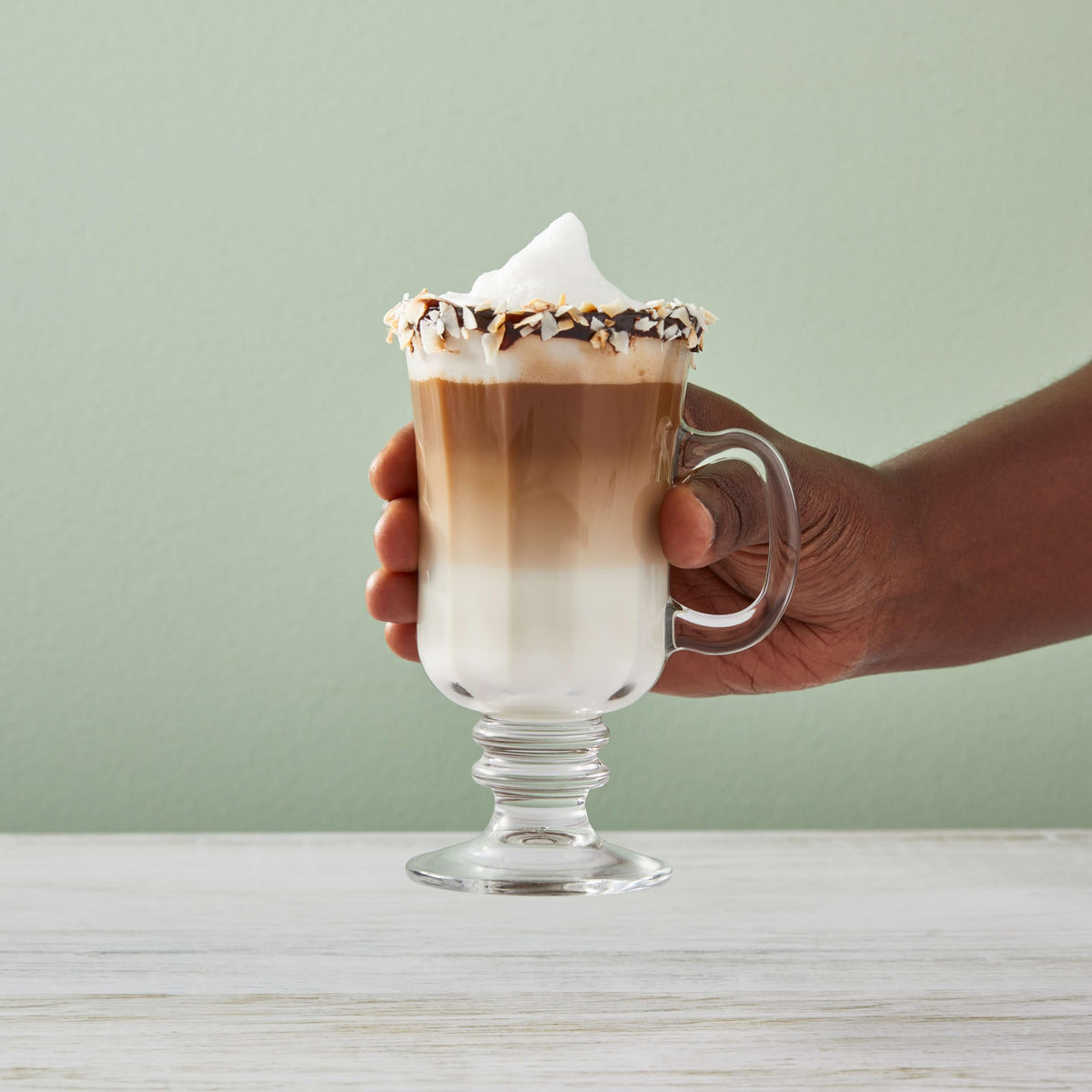 Classic coconut syrup swirls into hot cocoa for a cozy tropical twist