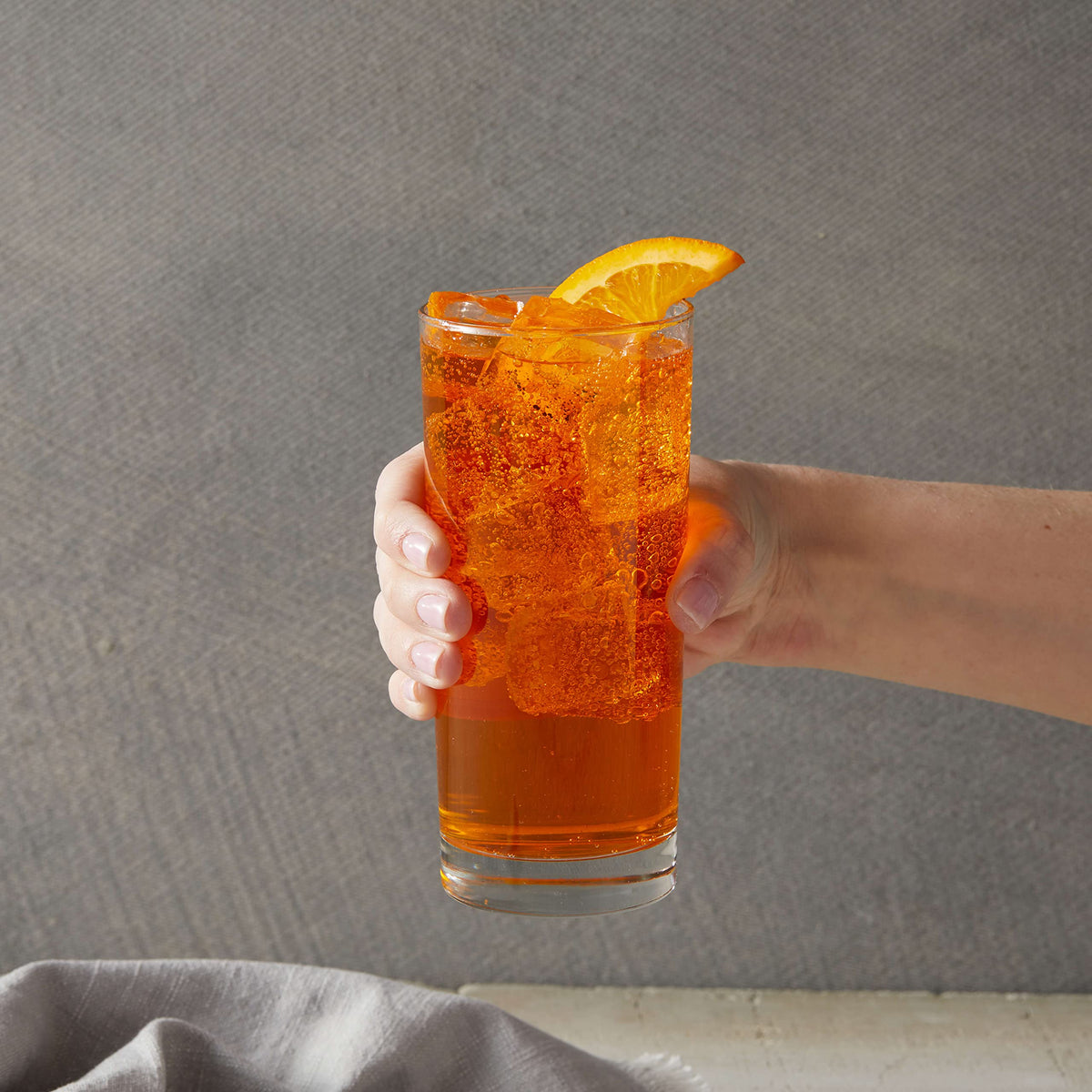 Backbar setup with DaVinci Classic Orange Syrup display for versatile drinks