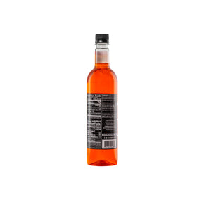 DaVinci Gourmet Classic Orange Syrup being poured, offering balanced sweetness for beverages