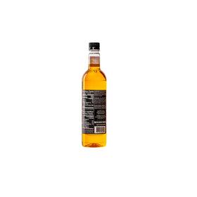 Pouring DaVinci Gourmet Classic Pineapple Syrup for quick cocktail blends
