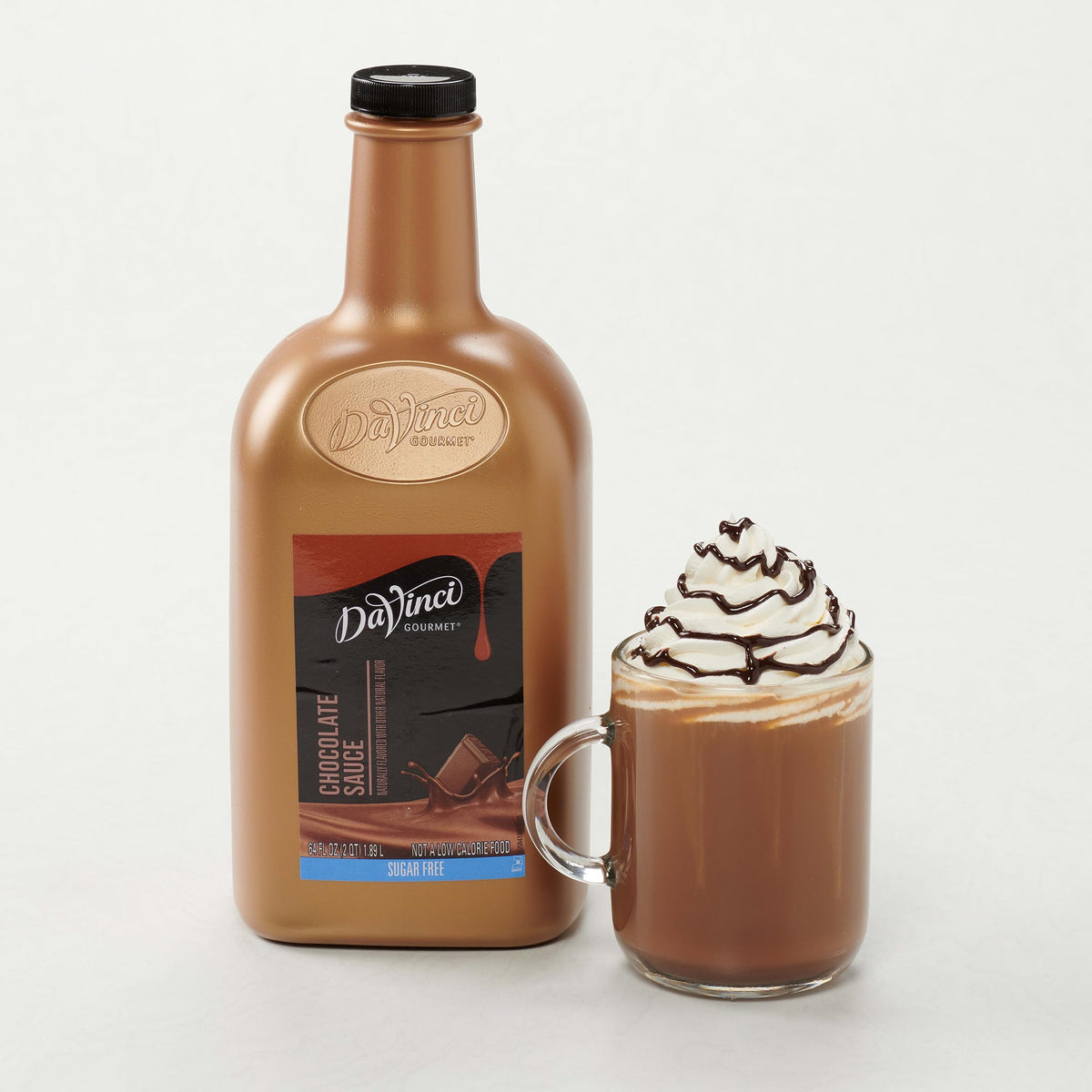 DaVinci Gourmet Sugar Free Chocolate Sauce bottle at a barista station.