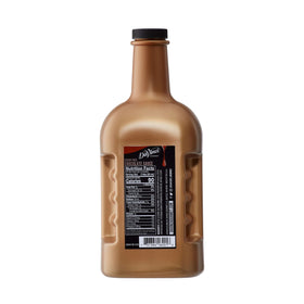 DaVinci Gourmet Sugar Free Chocolate Sauce pouring into coffee cup for indulgent flavor.