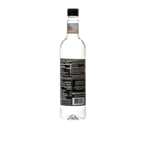 Pouring DaVinci Sugar-Free Cinnamon Syrup adds warm cinnamon notes.
