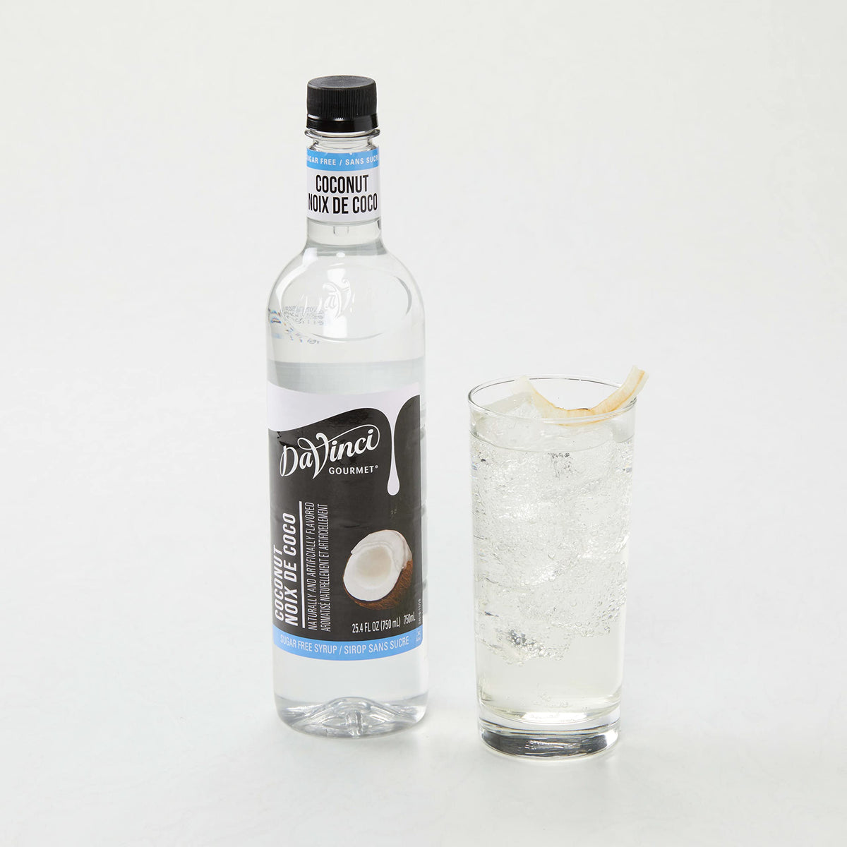 DaVinci Gourmet Sugar Free Coconut Syrup in glass tea, coconut aroma enhances daytime sip.