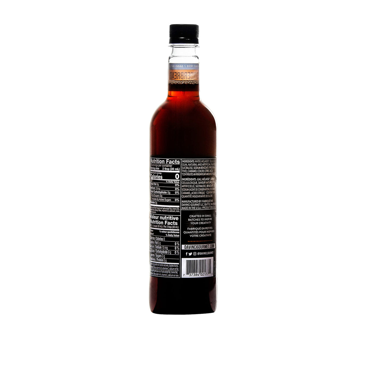 Pouring DaVinci Gourmet sugar-free gingerbread syrup into coffee for holiday flavor.