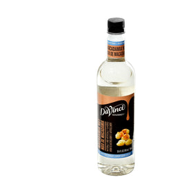Cocktail glass with DaVinci Macadamia Syrup drizzle showcasing beverage creativity.