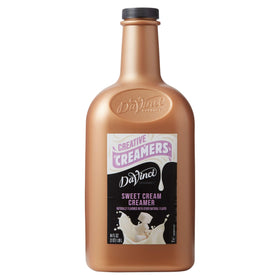 DaVinci Gourmet Sweet Cream bottle pouring to enrich coffee with creamy texture