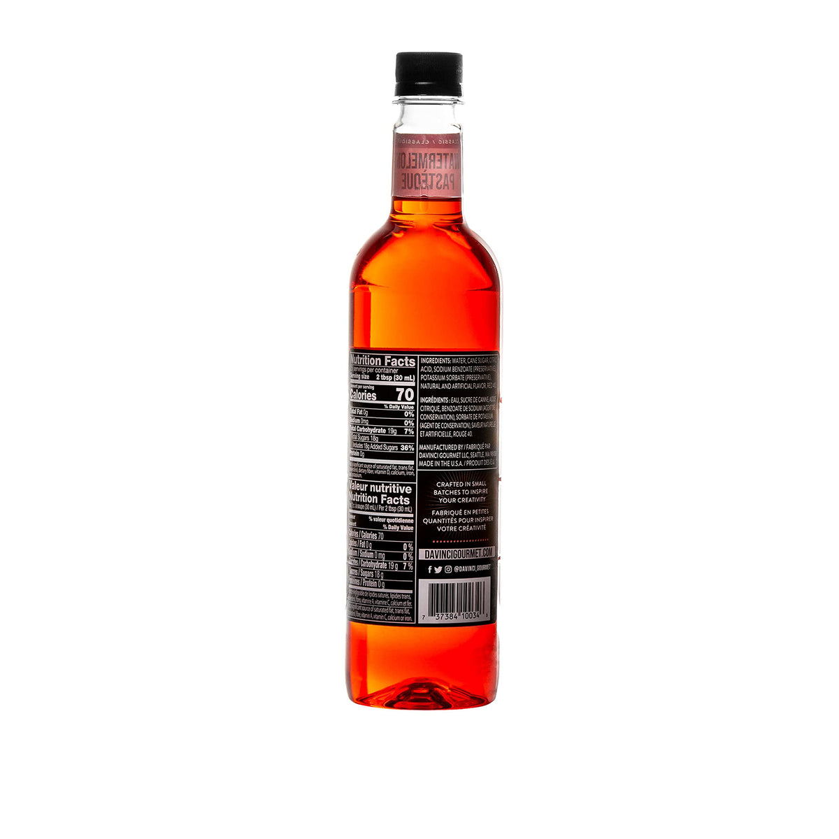 Pouring DaVinci Gourmet Watermelon Syrup into a glass.