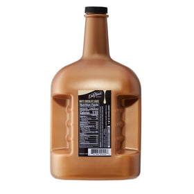 DaVinci Gourmet White Chocolate Sauce drizzle on whipped cream for decadence.