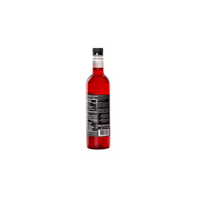 DaVinci Gourmet sugar-free strawberry syrup being poured into coffee.