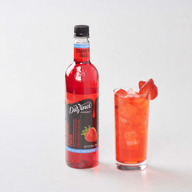 DaVinci sugar-free strawberry syrup in a cold beverage with ice.