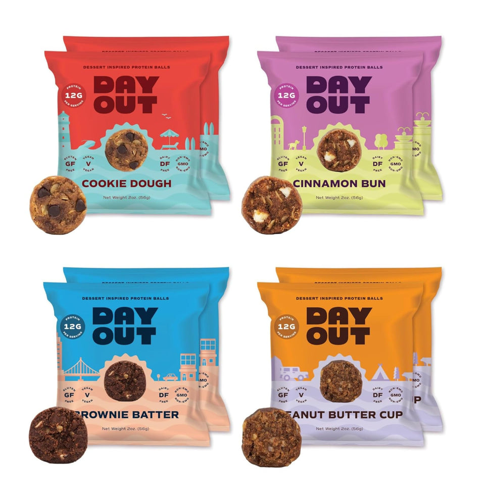 Day Out Protein Snack Balls variety pack in hand, convenient on-the-go energy bites.