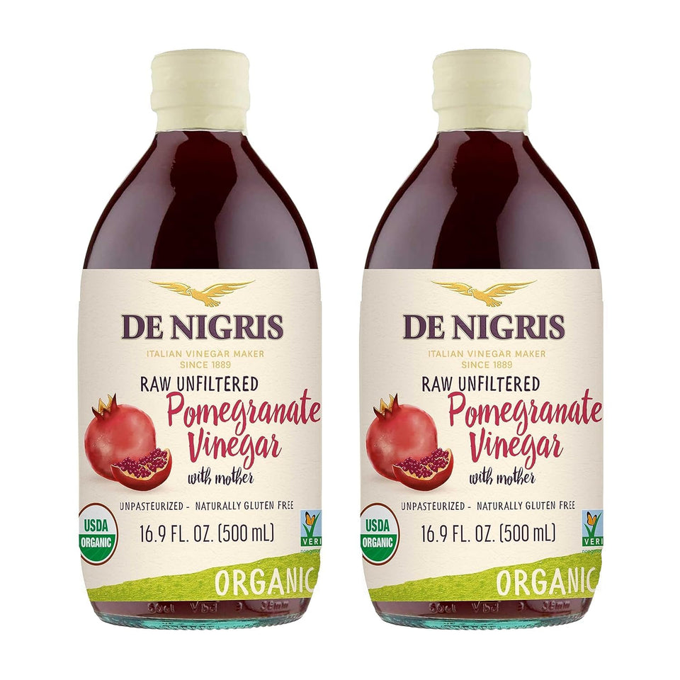 De Nigris Organic Pomegranate Vinegar bottle on the counter for bright salad flavor.