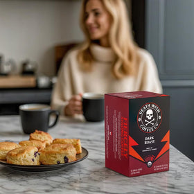Death Wish Coffee dark roast pods brew shot emphasizes deep bold body.