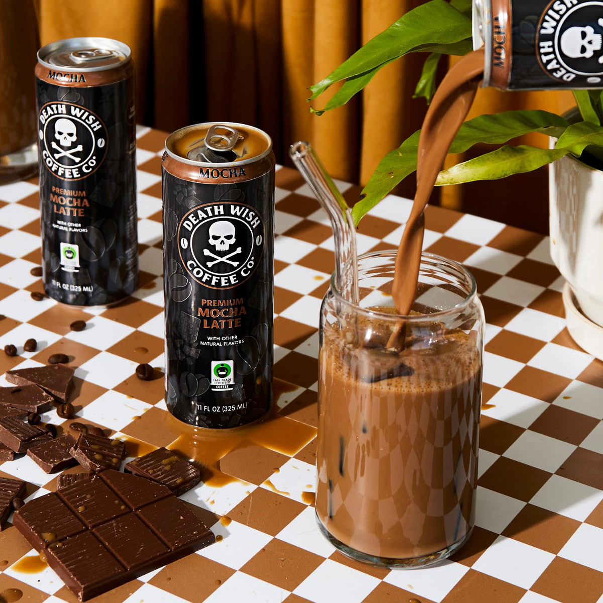 Death Wish Coffee mocha latte close-up emphasizing silky texture and creamy finish.