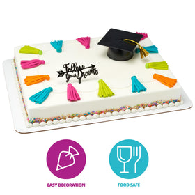 DecoPac graduation cap topper close-up shows glossy food-safe plastic and tassels