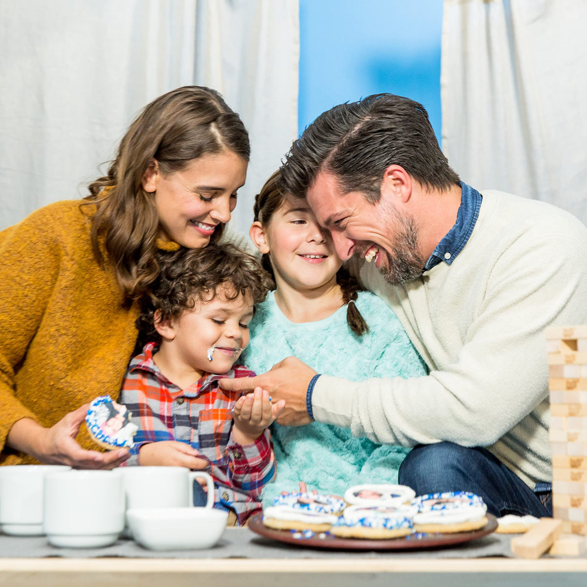 Professional cake decorating setup using PhotoCake frosting sheets