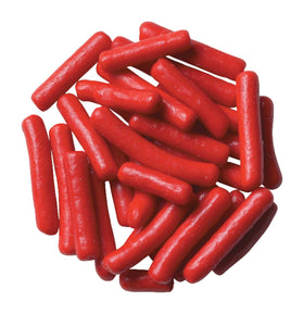 DecoPac red sprinkles on cake for vibrant color and festive flair.