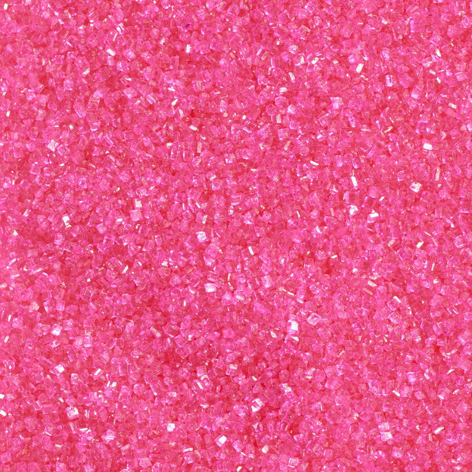 DecoPac pink sanding sugar in a sprinkles-top jar for easy cake decoration