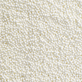 DecoPac white nonpareils in a handheld container for easy, mess-free decorating.