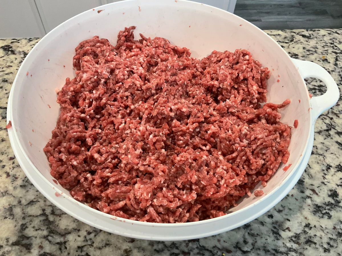 Deep Lake Butcher's Blend sausage patties cooking releasing savory aroma