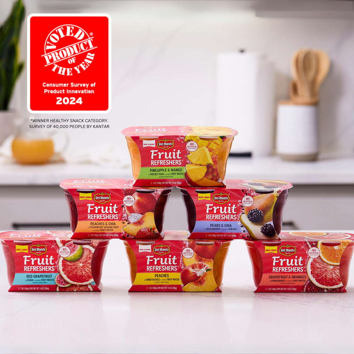 Grapefruit and orange segments in pomegranate water, bursting with fresh flavor.