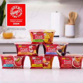 Grapefruit and orange segments in pomegranate water, bursting with fresh flavor.