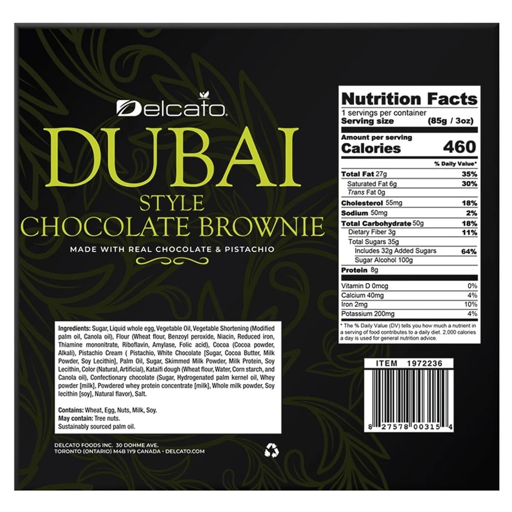 Delcato fudgy dark chocolate brownie with pistachio topping close-up showing texture.
