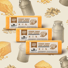 Deli Direct Smokey Sharp Cheddar slices, perfect for sandwiches.