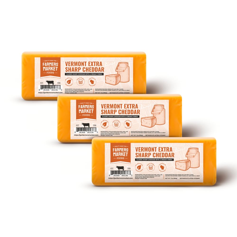Deli Direct Wisconsin Extra Sharp Cheddar block on a cutting board ready for slicing.