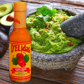 Paella finished with Delidas sauce for bright spice and aroma.