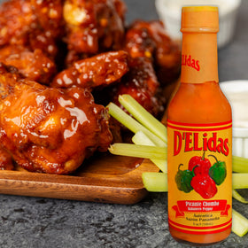 Pouring Delidas Habanero on wings evokes bold, balanced heat.