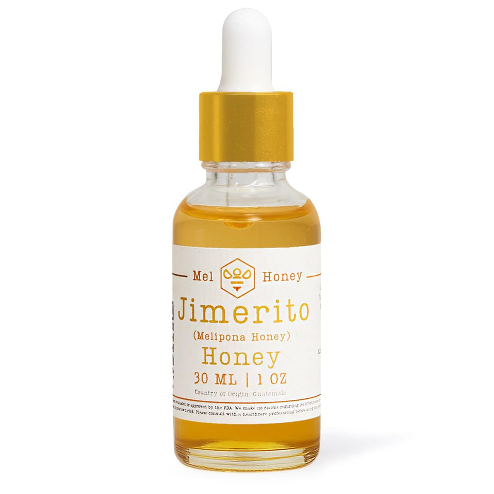DELUXE SCOOTERS Melipona honey 30 ml bottle for natural sweetness in tea or yogurt.