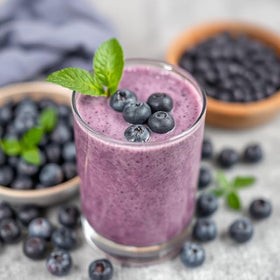 Blueberry powder in a smoothie delivering vibrant flavor