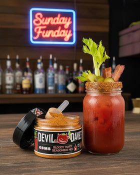 Devil Daves seasoning tub with scoop for easy batch prep at events.