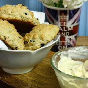 Close-up of 55% butterfat clotted cream; rich, spreadable texture for generous dollops.