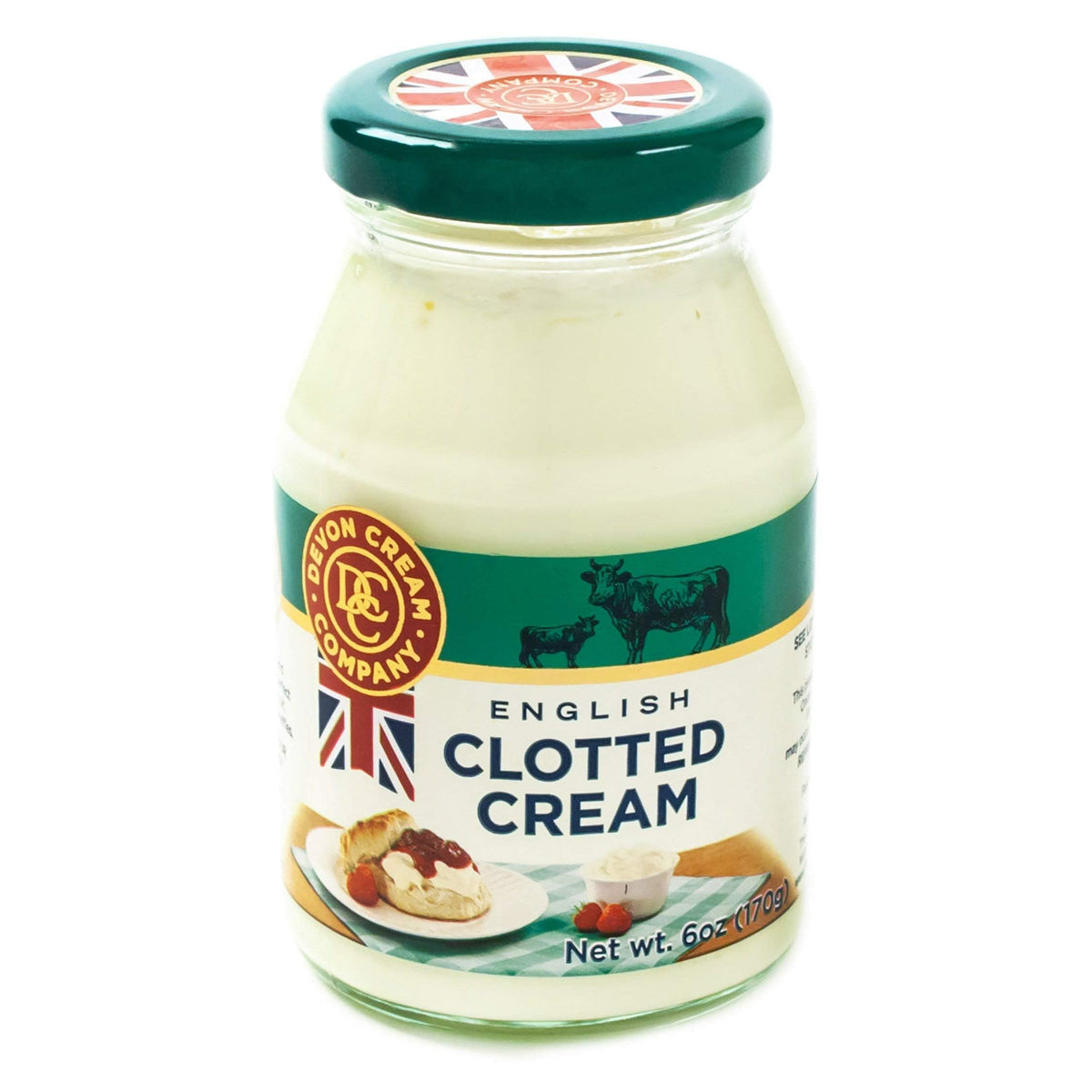 Devon Cream Company clotted cream plain on a warm scone, showcasing a luscious buttery texture.