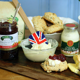 High tea setup featuring Devon Cream Company clotted cream for a classic indulgent moment.
