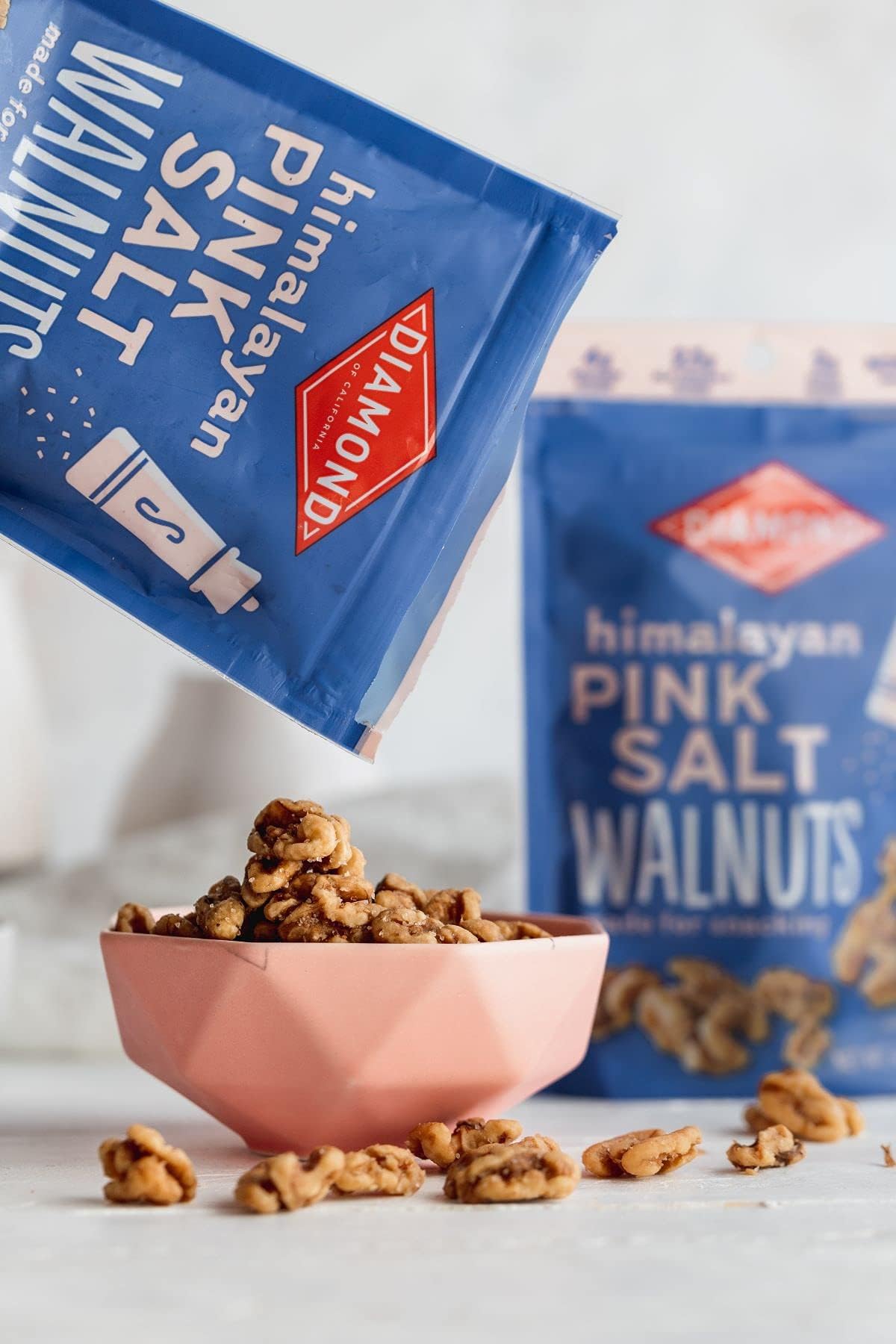 Diamond of California walnut topping sprinkled over a crisp salad.