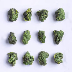 Dian Mai Hao mulberry tea yellow-green infusion—refreshing brew for a quick break.