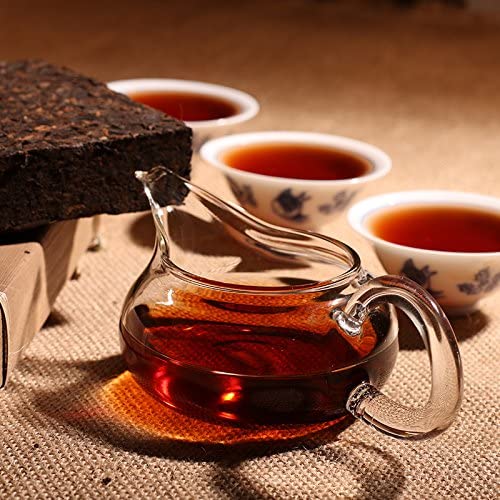 Dian Mai Hao ripe Pu-erh tea brick close-up shows rich aroma and smooth brew.