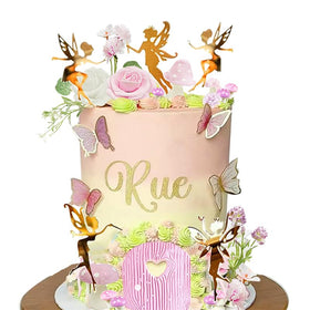 DiDida artificial flowers and butterflies enhance fairy-theme desserts.