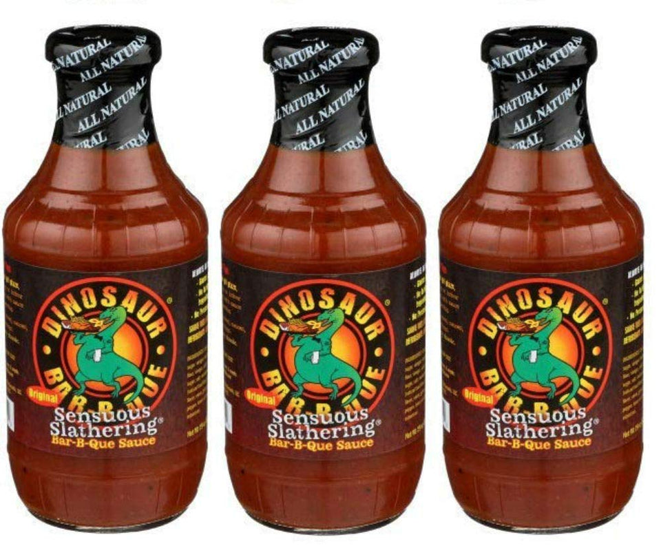Dinosaur Bar-B-Que Original Sensuous Slathering sauce bottle ideal for grilling, dipping, and basting.