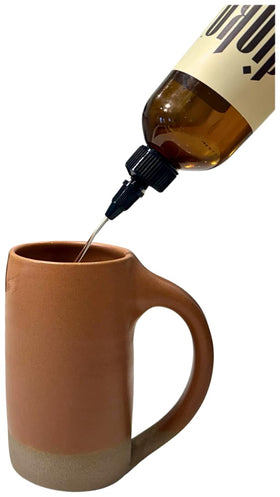 Dioko Vanilla Syrup enhances latte with cafe-quality vanilla notes.