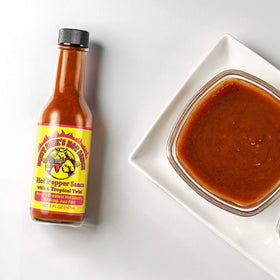 Dirty Dicks Peachy Green bottle highlights fruity notes ideal for burgers and salads.