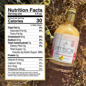 Dirty Pelican Lychee Blossom bottle label highlights organic and preservative-free
