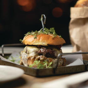 Divina caramelized onion jam served on bread to highlight rich, tangy-sweet flavors
