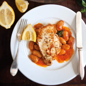 Oven-baked dish with shrimp and feta featuring Divina beans